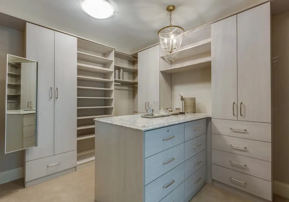 custom closet with granite counter tops in grey